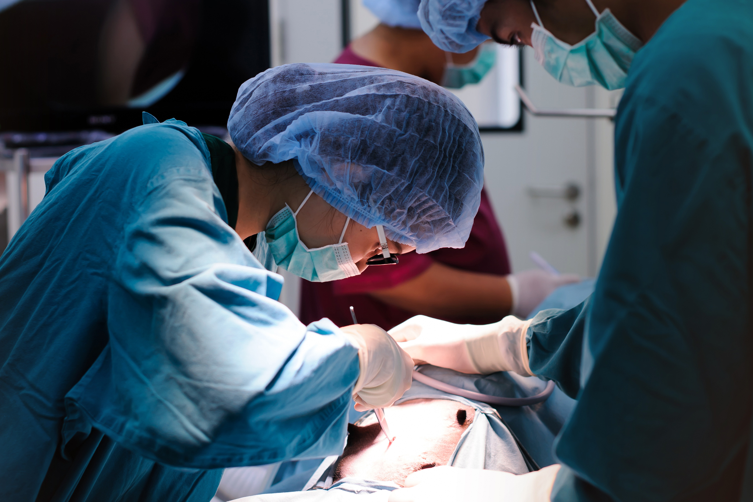 Doctors performing surgery